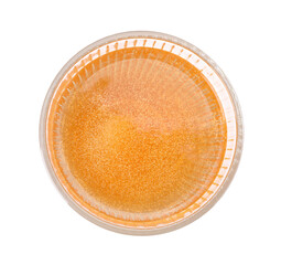 Tasty cider in glass isolated on white, top view