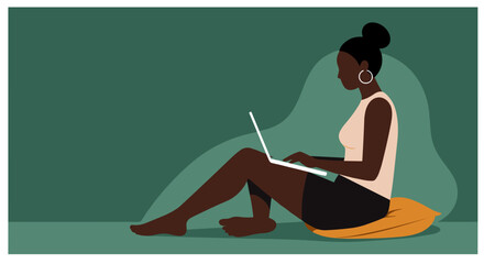 Relaxed woman working or studying on a laptop at home, embodying remote productivity, online learning, and a digital lifestyle.