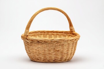 Obraz premium Empty, light beige wicker basket with a curved handle