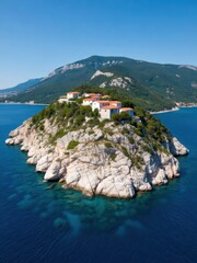 Naklejka premium Scenic aerial view of coastal island with historic buildings mediterranean sea high-resolution image clear sky natural beauty