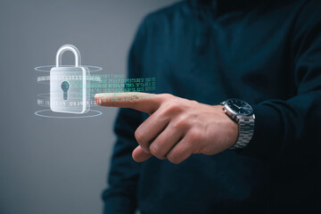 Man touches holographic padlock representing digital security and data protection