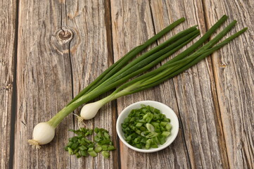 Fresh white onion an wooden table. 