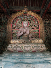 buddha statue and sculpture art in ancient Chinese temple
