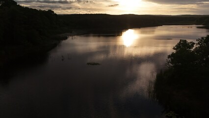 Aerial View of Lake at Sunset with Reflection