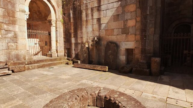 Braga Cathedral exteriors display Romanesque portals gothic pinnacles and weathered granite walls anchoring the old town in Braga, Portugal