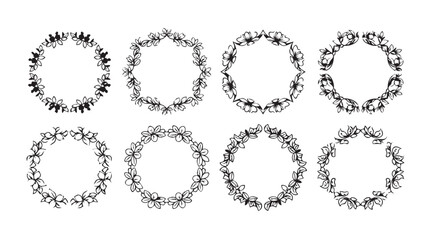 Collection of ornate botanical wreaths and flourishes delicate floral circles elegant design elements silhouette