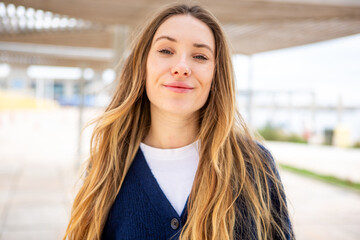 Confident young woman portrait outdoors
