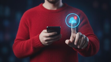 A person is holding a phone and pointing at glowing blue alert icon showing notification alert and digital communication