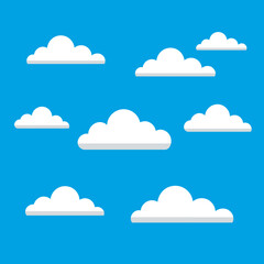 Collection of fluffy white cartoon clouds scattered across a vibrant clear blue sky background