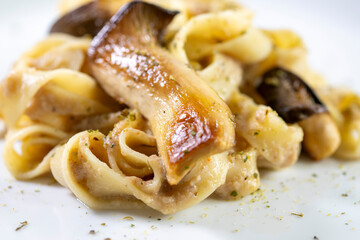 Homemade Italian fettuccine pasta with mushrooms and cream sauce
