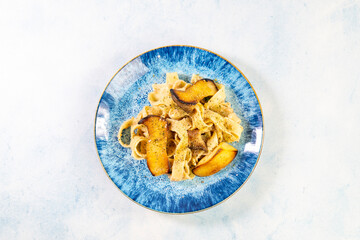 Homemade Italian fettuccine pasta with mushrooms and cream sauce