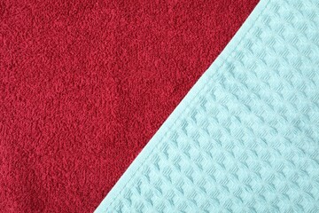 Fototapeta premium Terry and waffle towels as background, top view