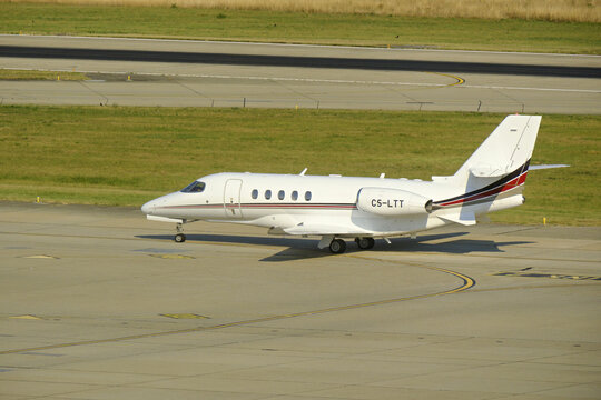 Geneva, Switzerland - august 26, 2025: sign and logo on an Cessna Citation Latitude of NetJets on the runway at Geneva airport
