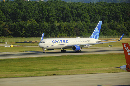 Geneva, Switzerland - august 26, 2025 :sign and logo on a Boeing 767 - 300 of United Airlines plane take off from Geneva airport