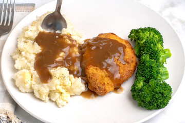 chicken breast  with mash potatoes and gravy