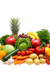 Diverse, colorful flat lay of fresh organic fruits and vegetables (pineapple, grapes, carrots) on a transparent studio background with ample copy space, concept of healthy eating and natural produce.