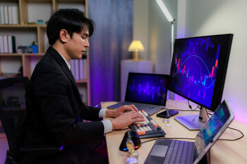 Trader analyzing online stock charts with concern as the market falls.