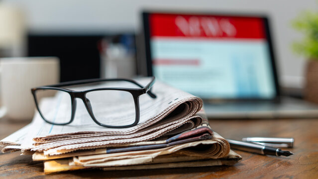 newspapers and glasses
