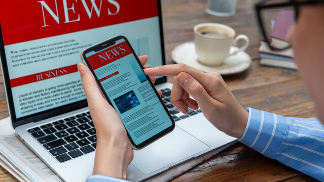 business woman using tablet pc for reading news