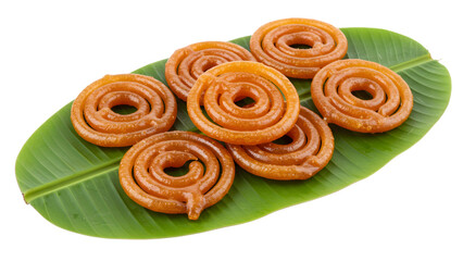Fototapeta premium Pile of jalebi indian sweets on a banana leaf isolated on transparent background