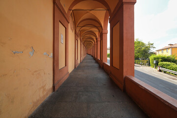 Historic porticoes in Bologna leading to the Sanctuary of the Madonna of San Luca.