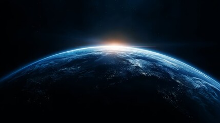 Obraz premium Earth viewed from space with sunrise illuminating the horizon