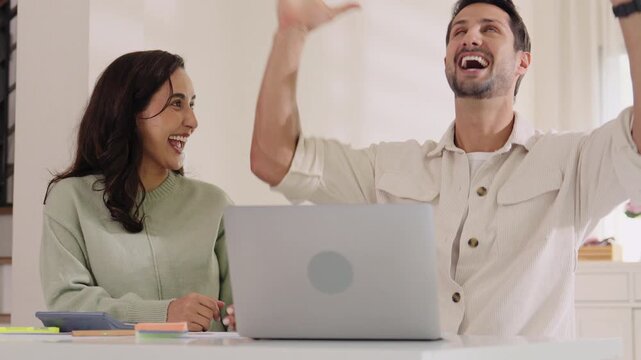 Couple using tablet and credit card to shop online through e-commerce app, making payment and browsing modern platform with promo codes and discount offers