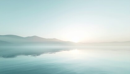Fototapeta premium Serene Lake Reflection Tranquil Morning Sunrise over Misty Mountains with Calm Water and Peaceful Atmosphere