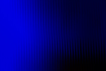Obraz premium Blue to black gradient striped abstract background with vertical lines creating modern futuristic digital texture for technology wallpaper