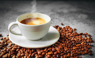 Coffee cup and coffee beans on gray background, Espresso crema coffee cup aromatic