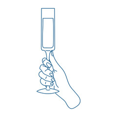 Hand holding a celebratory glass while toasting at a joyous event during an evening gathering