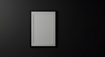 Minimalist black frame mockup on dark wall.