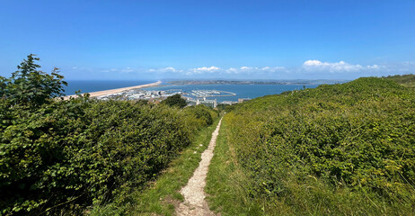 Portland Harbour and Chesil Beach from high up near Verne Prison, Portland, Dorset UK