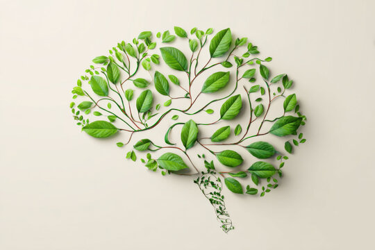 Brain with Nature Elements – Mental Health Awareness. Conceptual image of a human brain overlaid with leaves, trees, or natural textures. Symbolizes mental wellbeing and the connection between mind an