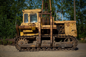 A close-up of an old bulldozer-based pipe layer