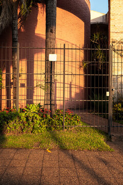 Conceptual contrast of plants and architecture with sunset tones in Asuncion, Paraguay