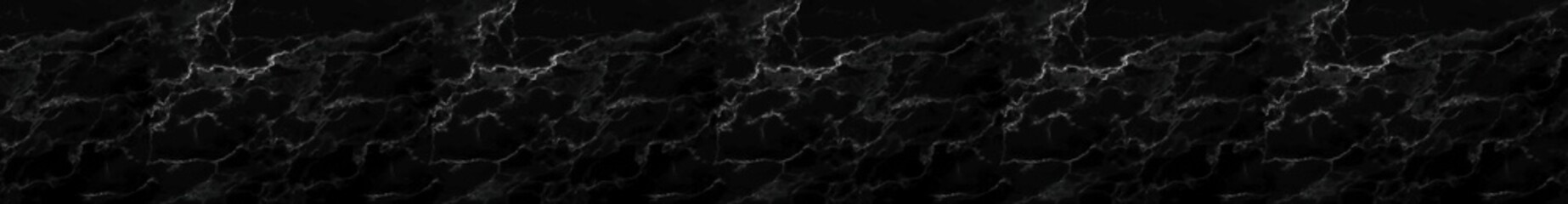 Black marble texture with fine white veins in dramatic natural stone background design