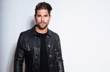 Fototapeta premium Handsome young man in leather jacket