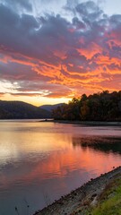 Colorful autumn sunset over a calm lake