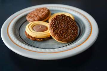 On the tray is a biscuit with hard and creamy chocolate, popularly called noblice