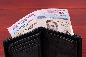 North Korean money in the black wallet