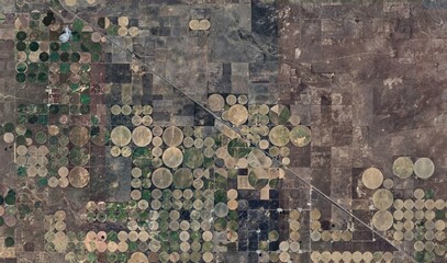 Kansas Farmland: High-Resolution Satellite View of Center Pivot Irrigation Patterns © Aerial View
