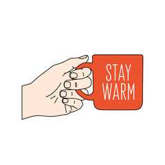 Hand holding red mug with Stay Warm text isolated on transparent background