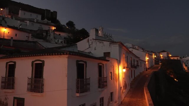 old town of the historic city of Mertola, a settlement with mediterranean style white houses situated on a hill with ann ancient castle, Alentejo, Portugal.