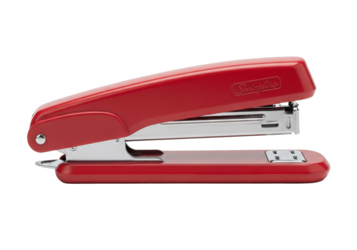 Bright red stapler positioned on a clean desk with scattered papers and office supplies in the background