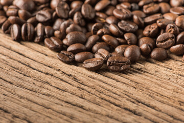 Coffee Beans on Wood Background