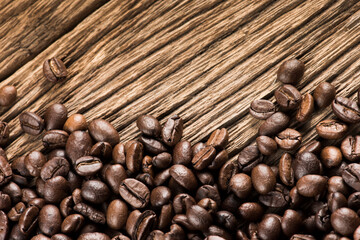 Coffee Beans on Wood Background