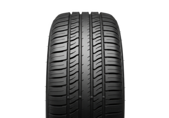 Close-up view of a new car tire showcasing tread pattern and rubber texture against a plain background