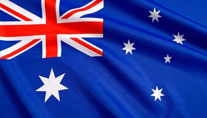 Close-up view of the Australian national flag, showcasing its vibrant colors and intricate design with a rippled texture.