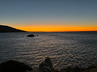 Golden Sunset with Rock in Foreground